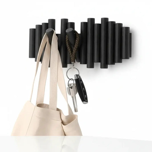 Wall-mounted coat rack with retractable pegs Retractable-0