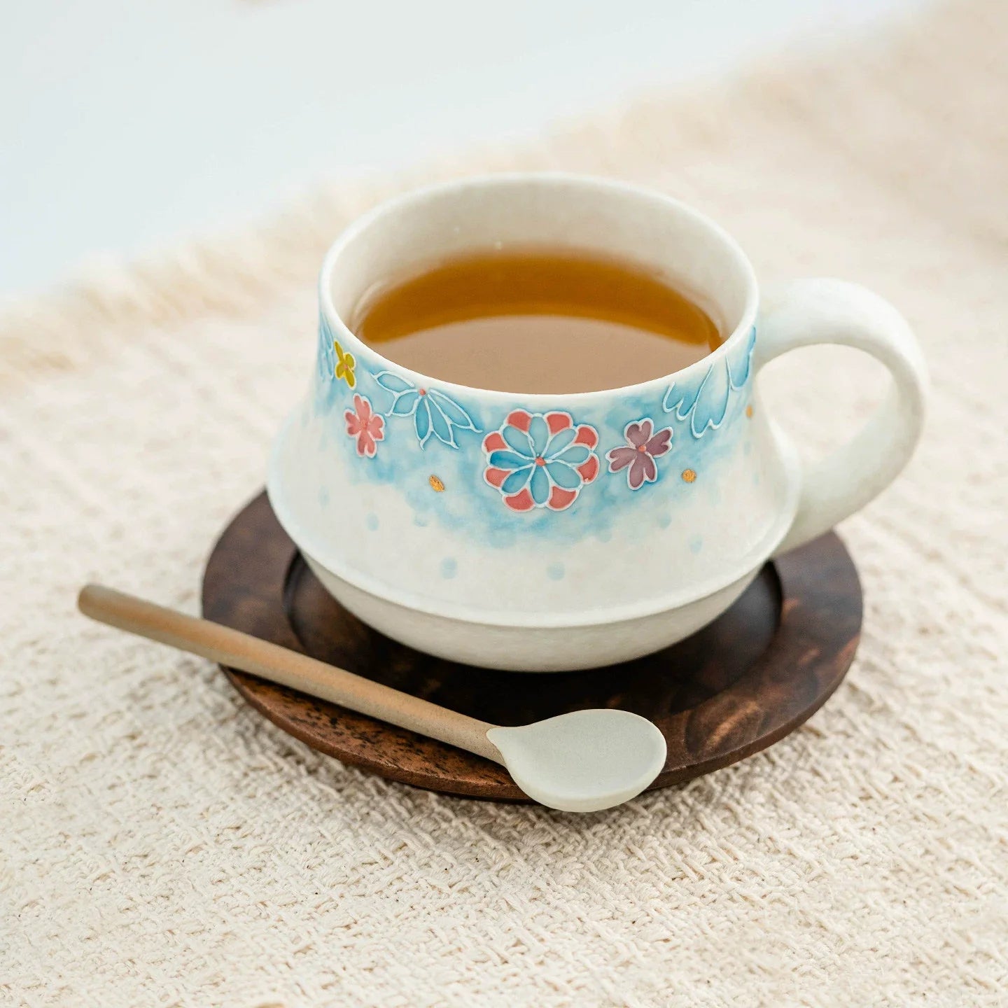 Round Dew Artisanal Ceramic Coffee Cup – Hand-Painted Azure Blossom Edition-2